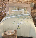 Chickadees and Apple Trees Duvet Cover